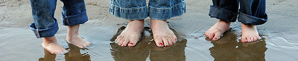 Child feet in the rain image